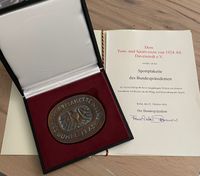 Plakette mit Urkunde